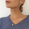 Ladies' Birthstone Heart Locket Necklace in Gold on Model