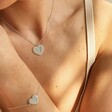 Model Wearing Lisa Angel Diamante Heart Necklace in Silver and Matching Bracelet