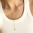 Model Wearing Lisa Angel Mismatched Heart Lariat necklace in Gold