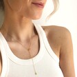 Model Wears Mismatched Heart Lariat necklace in Gold From Lisa Angel