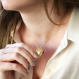 Model Wears Lisa Angel Gold Personalised Sunbeam Heart Locket Necklace