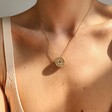 Ladies' Rainbow Crystal Spinning Pendant Necklace in Gold From Lisa Angel on Model