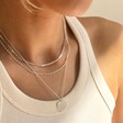 Model Wears Lisa Angel Disc Chain Necklace in Silver Layered