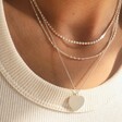 Model Wears Lisa Angel Ladies' Scalloped Edge Heart Necklace in Silver