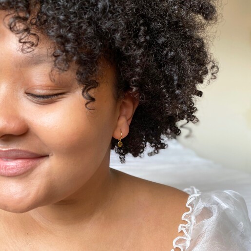 Model Wearing Lisa Angel Gold Sterling Silver Star Disc Charm Huggie Hoop Earrings
