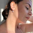 Model Wearing Lisa Angel Sterling Silver Heart Charm Huggie Hoop Earrings