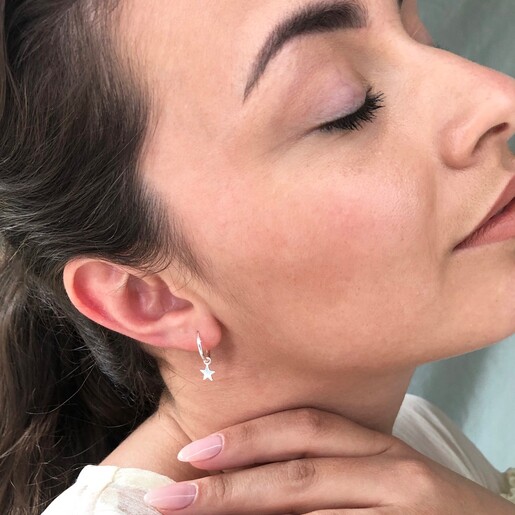 Model Wearing Lisa Angel Ladies' Sterling Silver Star Charm Huggie Hoop Earrings