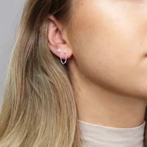 Model Wears Lisa Angel Double Pearl Stud Chain Earring in Silver