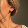 Model Wears Lisa Angel Hammered Bar and Pearl Stud Earrings in Silver