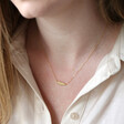 Delicate Gold Sterling Silver Feather Necklace on Model