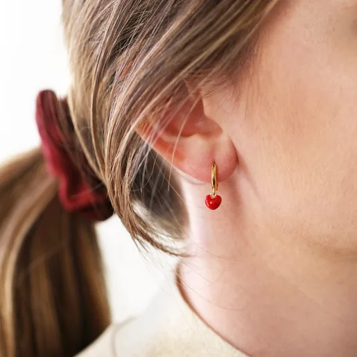 Model Wears Red Enamel Heart Charm Huggie Hoop Earrings