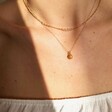 Lisa Angel Ladies' Tiny Orange Pendant Necklace in Gold on Model