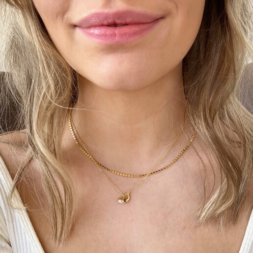 Model Wears Lisa Angel White and Gold Whale Pendant Necklace