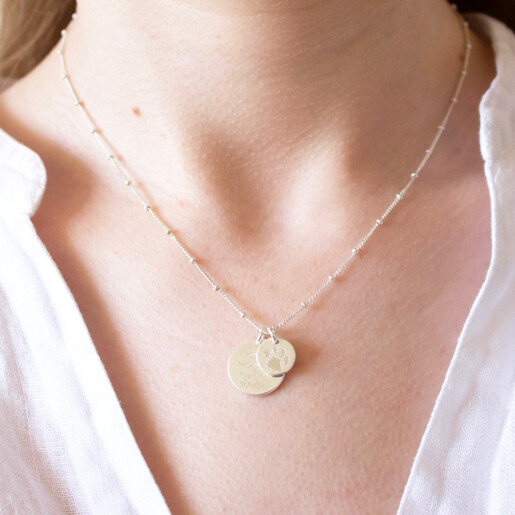 Model Wearing Lisa Angle Personalised Sterling Silver Paw Print Disc Charm Necklace