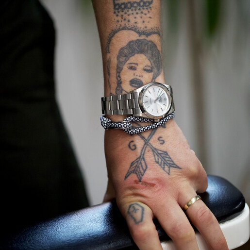 Model Wearing Men's Adjustable Black and White Rope Bracelet