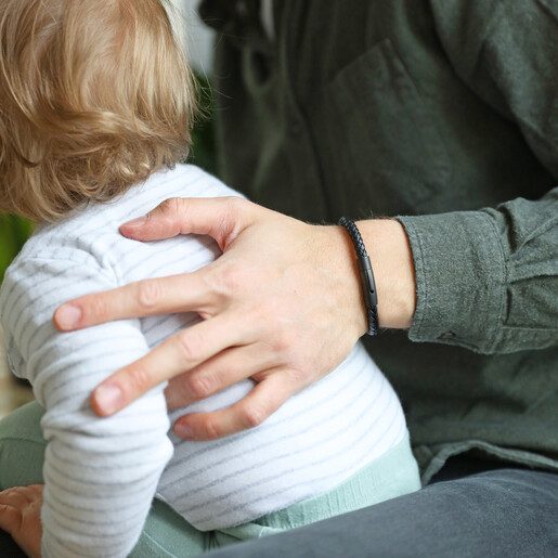 Model Wearing Men's Personalised Leather Bracelet with Matt Black Clasp