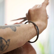Lisa Angel Men's Engraved Woven Bracelet with Magnetic Clasp on Model