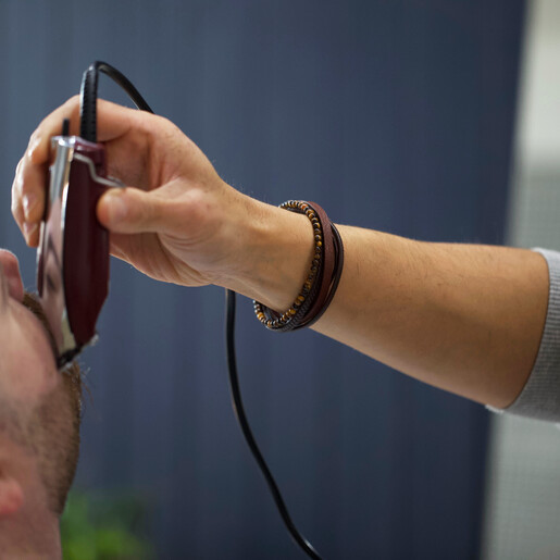 Model Wearing Men's Leather and Tiger Eye Bead Bracelet