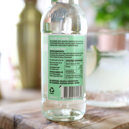 ingredients list of artisan drinks co amalfi lime tonic with cocktail shaker and plant in background