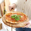 Model Serving Pizza on Round Olive Wood Pizza Board