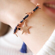 Model Wearing Navy and Rose Gold Star Charm Friendship Bracelet