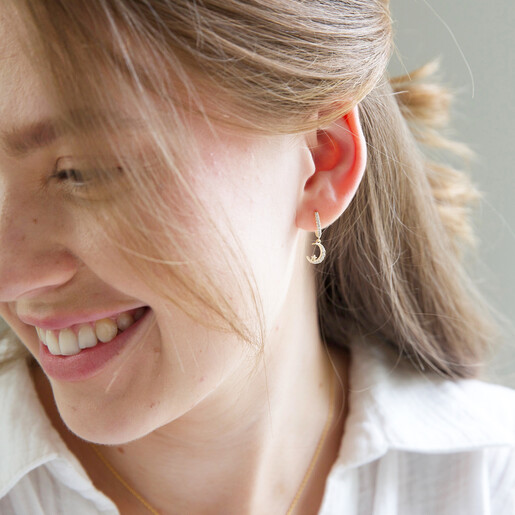 Lisa Angel Crystal Moon Huggie Hoop Earrings in Gold on Model