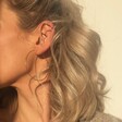 Model Wearing Lisa Angel Large Thin Hoop Earrings in Gold Sterling Silver