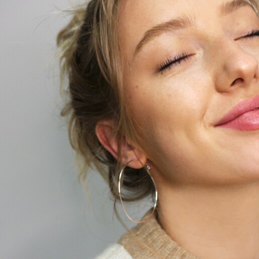 Model Wearing Lisa Angel Large Thin Hoop Earrings in Sterling Silver