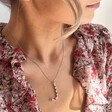 Model Wears Large Beaded Initial Pendant Necklace in Gold From Lisa Angel