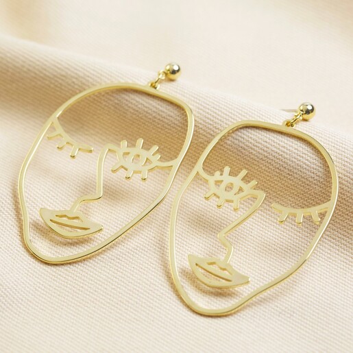 Metal hot sale face earrings