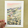 Model Holding Sunset Flower Field Greeting Card 