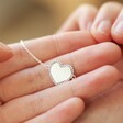 Model Holding Diamante Crystal Heart Bracelet in Silver