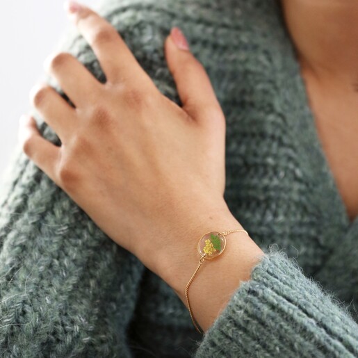 Lisa Angel Ladies' Pressed Birth Flower Charm Bracelet in Gold on Model