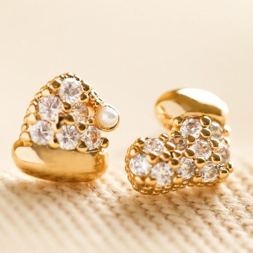 Close Up of Tiny Crystal Santa Hat and Stocking Stud Earrings