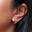 Pink and Green Baguette Crystal Huggie Hoop Earrings on Model
