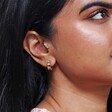 Model Wearing Rainbow Crystal Cluster Barbell Earring in Gold in Tragus Piercing