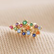 Rainbow Crystal Cluster Barbell Earring in Gold on Beige Fabric