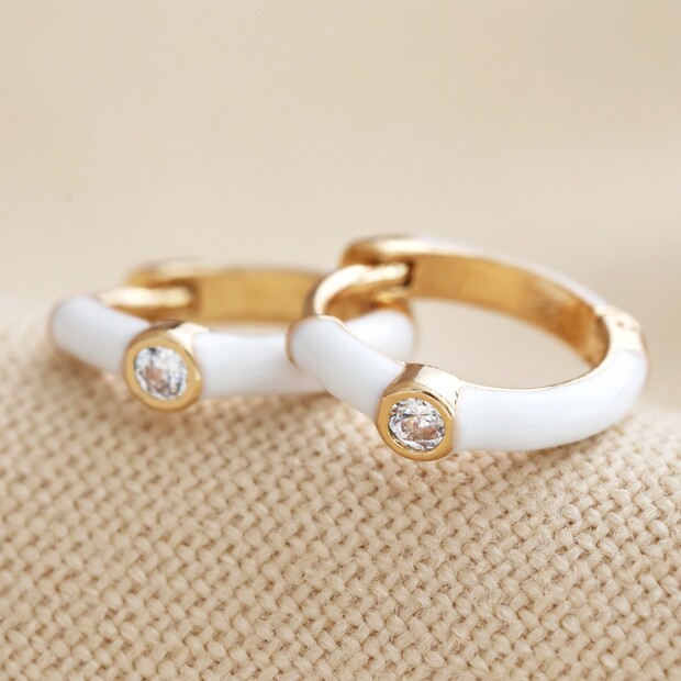 White Enamel Crystal Huggie Hoop Earrings in Gold White Enamel Crystal Huggie Hoop Earrings in Gold