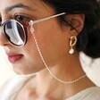 Model Wears Lisa Angel Gold and White Enamel Face Mask and Glasses Chain