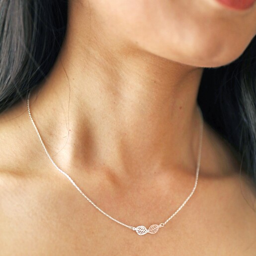 Model Wearing Linked Filigree Leaf Necklace in Silver From Lisa Angel