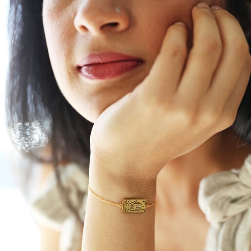 Model wearing the Gold Fortune Tarot Card Bracelet