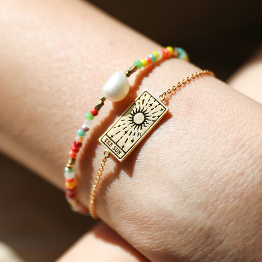 Model Wearing Layered Gold The Sun Tarot Card Bracelet