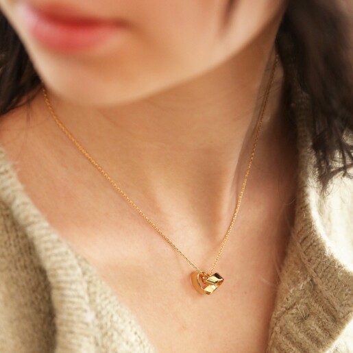 Model Wearing Infinity Heart Knot Necklace in Gold