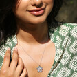 Model Wearing Large Flower Pendant Necklace with Pearl in Silver