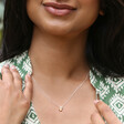 Model Wearing Organic Hammered Droplet Charm Necklace in Silver