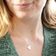 Model Wearing Personalised Organic Friendship Petal Pendant Necklace in Silver