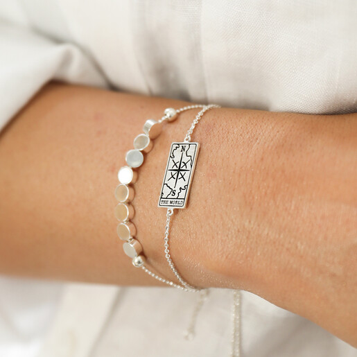 Silver The World Tarot Card Bracelet Layered on Model