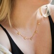 Model Wearing Tiny Bee Charms Necklace in Gold