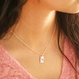 Tiny Hammered Love Oracle Card Pendant Necklace on Model