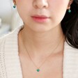 Model Wearing Matching Earrings and Tiny Teal Enamel Heart Necklace